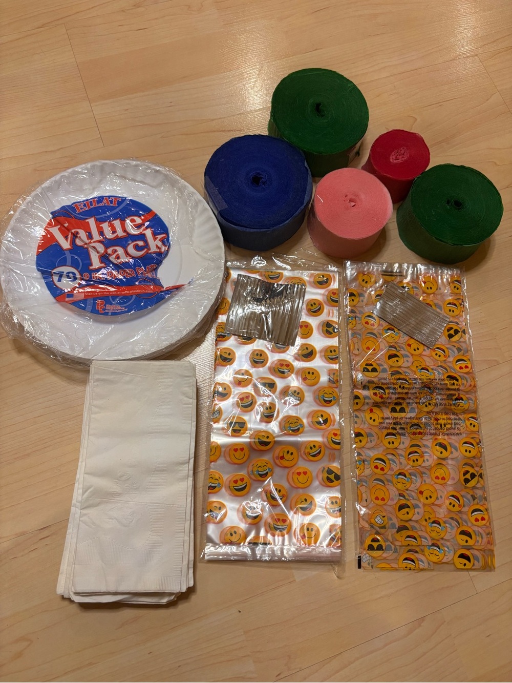 Value Pack White Party Plates with Emoji Treat Bags and Multicolor Streamers